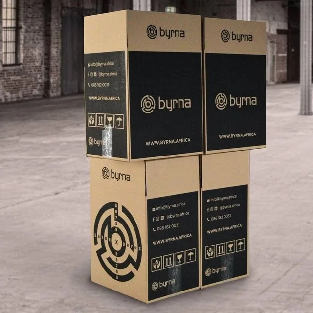 Stacked Byrna kraft shipping boxes printed in black with a target on the side