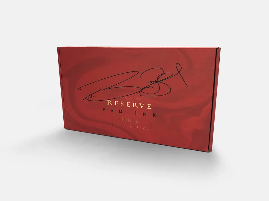 Red Ink Reserve Shiraz mailer box in deep red with a black signature